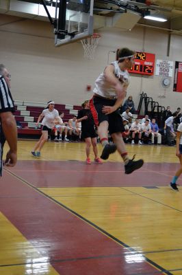  Students Teacher Basketball
 Students and teachers did about as much playing around as they did playing basketball during the students versus teachers co-ed basketball game at Old Rochester Regional High the evening of March 7. The teams were neck and neck throughout the evening – students in white and teachers in black – and neither team seemed to have an advantage over the other at any point during the game. Photo by Jean Perry
