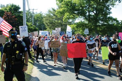 BLM Rochester
A “Black Lives Matter” protest march drew hundreds to Rochester late in the afternoon of June 12. Escorted by several Rochester policemen on foot, participants who had gathered in front of Town Hall marched down Dexter Lane to the police station, where several individuals spoke about racism and told stories of discrimination based on skin color. The protest was organized by Wareham resident Alexis Sylvia, who had spent several years living in Mattapoisett and Rochester. Photos by Mick Colageo
