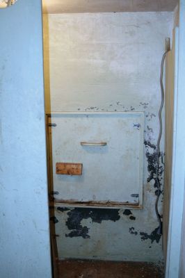 Bombs Away
A look into a bomb shelter discovered by the owner at the former Dempseys Village Sampler in Rochester. This escape hatch leads to a tunnel and up to a second exit in the yard from the bomb shelter. Photo by Paul Lopes
