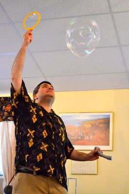 Mike the Bubble Man
Mike Dorval, aka Mike the Bubble Man, wowed Tri-Town children on June 23 with his exciting presentation on the science behind bubbles. The show kicked off the Plumb Library’s summer reading program, and the Rochester Cultural Council helped fund the event. Photos by Jean Perry
