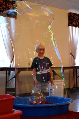 Mike the Bubble Man
Mike Dorval, aka Mike the Bubble Man, wowed Tri-Town children on June 23 with his exciting presentation on the science behind bubbles. The show kicked off the Plumb Library’s summer reading program, and the Rochester Cultural Council helped fund the event. Photos by Jean Perry
