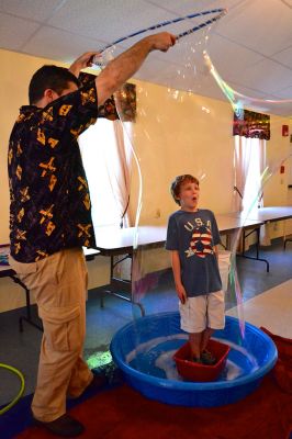 Mike the Bubble Man
Mike Dorval, aka Mike the Bubble Man, wowed Tri-Town children on June 23 with his exciting presentation on the science behind bubbles. The show kicked off the Plumb Library’s summer reading program, and the Rochester Cultural Council helped fund the event. Photos by Jean Perry
