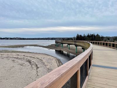 Mattapoisett Bike Path
A newly signed Memorandum of Understanding between the Town of Mattapoisett and the Commonwealth of Massachusetts has opened the Shining Tides section of the Mattapoisett Bike Path. On Monday, people and dogs could be seen along the attractive structure that connects Reservation Road to Goodspeed Island Road. Photo by Faith Ball
