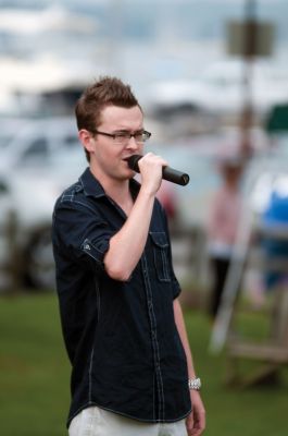 National Anthem
Mattapoisett native and former contender on NBC's The Voice, Devon Barley, started the 2011 Mattapoisett Road Race with the National Anthem at Shipyard Park on July 4, 2011. Photo by Felix Perez.
