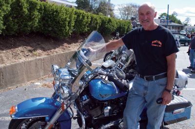 Bike Run 
Brad Barrows Athletic Fund committee member Dick Barrett prepares for the motorcycle run on Saturday, September 17, 2011. Photo by Felix Perez.
