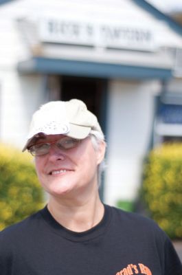 Bike Run 
Volunteer Beth Andrews stands in front of Rick's Tavern on Saturday, September 17, 2011 after the Brad Barrows Memorial Bike Run departed. Photo by Felix Perez.
