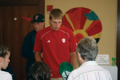 Gatemen at the Library
Fred Shepard, a pitcher from Amherst College, participates in arts and crafts with local children. Photo by Katy Fitzpatrick. 
