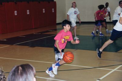 Basketball Bonanza Fundraiser
On March 20, Sippican Elementary School's sixth-graders narrowly defeated the teacher-parent team at their Basketball Bonanza Fundraiser for their annual Three-Day Appalachian Mountain Classroom (AMC) field trip. At the game, the students were elated when two area businesses each presented a check for over $600. The community has really come together to make sure every sixth grader gets to experience this amazing trip! Photo courtesy Sippican Sixth Grade Parents Group
