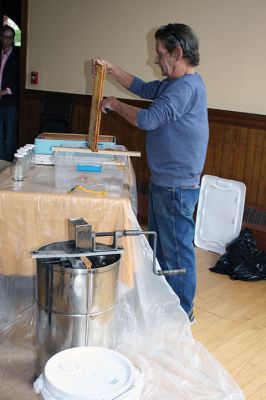 Bee Talk
Local cranberry grower and beekeeper Paul Rinta demonstrated honey extraction during a presentation on the plight of bees in North America given by his wife and business partner Linda Rinta, a local bee expert and educator. The event was a partnership between the Sippican Land Trust and Marion Garden Group and took place on September 30. Photos by Marilou Newell
