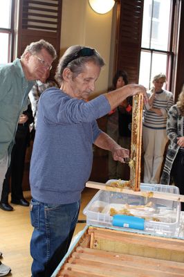 Bee Talk
Local cranberry grower and beekeeper Paul Rinta demonstrated honey extraction during a presentation on the plight of bees in North America given by his wife and business partner Linda Rinta, a local bee expert and educator. The event was a partnership between the Sippican Land Trust and Marion Garden Group and took place on September 30. Photos by Marilou Newell
