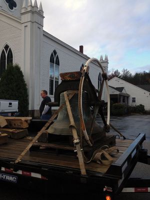 First Congregational Church of Rochester
The bell of the First Congregational Church of Rochester rang above the center of Rochester for the last time this morning, November 20, before it was lowered from the church’s belfry via crane to the ground, the final step of the renovation on the church. The historic bell, created in 1892 by an apprentice of Paul Revere III, grandson to our famous bell maker Paul Revere, will be refurbished and put in storage for some time before it is returned to the church. Photo by Jean Perry
