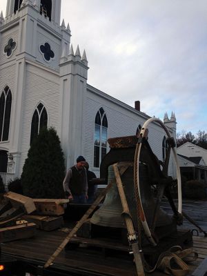 First Congregational Church of Rochester
The bell of the First Congregational Church of Rochester rang above the center of Rochester for the last time this morning, November 20, before it was lowered from the church’s belfry via crane to the ground, the final step of the renovation on the church. The historic bell, created in 1892 by an apprentice of Paul Revere III, grandson to our famous bell maker Paul Revere, will be refurbished and put in storage for some time before it is returned to the church. Photo by Jean Perry
