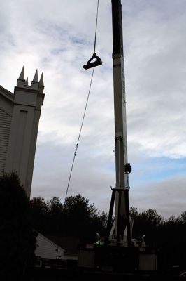 First Congregational Church of Rochester
The bell of the First Congregational Church of Rochester rang above the center of Rochester for the last time this morning, November 20, before it was lowered from the church’s belfry via crane to the ground, the final step of the renovation on the church. The historic bell, created in 1892 by an apprentice of Paul Revere III, grandson to our famous bell maker Paul Revere, will be refurbished and put in storage for some time before it is returned to the church. Photo by Jean Perry
