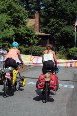 Homecoming Queens 
Colleen Oakes, originally from Marion, and Renee Buteyne, from Rochester, finished the trip of a lifetime on Monday, July 16, having ridden across the United States on their bicycles. Leaving Portland, Oregon on May 2, the two childhood friends arrived at Buteyne’s parents’ driveway about a month earlier than anticipated, greeted by family, friends, confetti, cookies, and of course, hugs. Photos by Jean Perry
