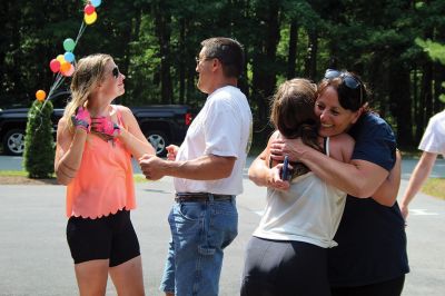 Homecoming Queens 
Colleen Oakes, originally from Marion, and Renee Buteyne, from Rochester, finished the trip of a lifetime on Monday, July 16, having ridden across the United States on their bicycles. Leaving Portland, Oregon on May 2, the two childhood friends arrived at Buteyne’s parents’ driveway about a month earlier than anticipated, greeted by family, friends, confetti, cookies, and of course, hugs. Photos by Jean Perry
