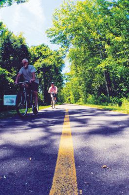 Bikeway Challenge
On Sunday, June 24, the Friends of the Mattapoisett Bike Path hosted their first annual South Coast Bikeway Challenge.  Local residents were invited to ride their bikes along the path in order to raise money for the completion of the ongoing project. In addition to the ride, live music was provided and the Mattapoisett Lions Club served lunch.  Pictured here from left to right; Chloe, Michael, Malcolm and Aimee Bean Enjoying Mattapoisett’s scenic bike path. Photo by Felix Perez.

