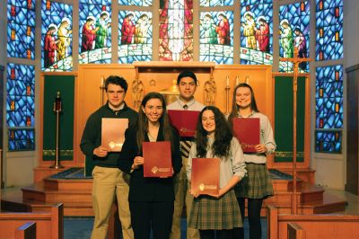 Bishop Stang High School 
Five Bishop Stang High School students have received 2018-19 Knights of Columbus awards for their submissions to the Catholic Citizenship Essay Contest: Elizabeth Golden of New Bedford, Chloe Katz of Tiverton, Eric Payette of Dartmouth, and Laurenne Wilkinson of Marion were each presented awards from the local K of C chapter in the Chapel of the Annunciation at the school by Mr. Philip Martin, the chair of the Theology Department at Bishop Stang. Quinn Sullivan of Westport received special recognition as th

