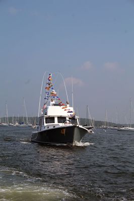 Blessing of the Fleet
The Reverend Eric Fialho, rector at Saint Gabriel’s Parish, presided as the Town of Marion held its first-ever Blessing of the Fleet on January 1 in Sippican Harbor. One tradition well established the past half-dozen years was the sunflower in the outer harbor, where several vessels tied up to one another at the stern and aimed their bows outward toward the sea in 360-degree formation. Photos by Mick Colageo
