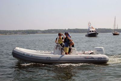 Blessing of the Fleet
The Reverend Eric Fialho, rector at Saint Gabriel’s Parish, presided as the Town of Marion held its first-ever Blessing of the Fleet on January 1 in Sippican Harbor. One tradition well established the past half-dozen years was the sunflower in the outer harbor, where several vessels tied up to one another at the stern and aimed their bows outward toward the sea in 360-degree formation. Photos by Mick Colageo
