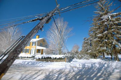 Blizzard of 2013
Hiller Road in Rochester is blocked by fallen tree. By the end of the storm the wind, ice and trees had caused power outages in 99% of all three towns. Photo by Felix Perez
