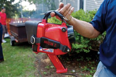 Marion Block Party
Party of the money raised at the 2012 Marion Block Party will go to help pay for a new thermal imager for the Marion Fire Department.  The tool helps firefighters locate victims when visitibility is low.  This imager, which will be replaced by the new one, was the original imager the Fire Department bought in the early 1990s.  Newer models are smaller and lighter.  Photo by Eric Tripoli.
