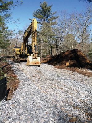 Blue Wave
Mattapoisett’s first solar project has begun with the installation of environmental screening and road construction to the interior site off Tinkham Hill Road. Blue Wave LLC has confirmed that Phase 1 will be completed by May. Phase 2 can’t begin until grid updates have been completed by Nstar. Photo by Marilou Newell
