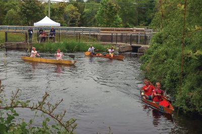 Rochester Memorial Day Boat Race
Competitors in the Rochester Memorial Day Boat Race were greeted by fog and a high tide, but the sun burned through the cloud cover, and the competitors emerged on the home stretch to the finish line where the Mattapoisett River reaches Route 6. It was the 90th anniversary of the race and the 50th for Peter MacGregor, who first entered the race at age 10. Photos by Michelle Kirby, Carolyn Pruchnik and Robert Price
