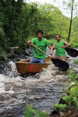 Rochester Memorial Day Boat Race
It rained, again, for the Rochester Memorial Day Boat Race on Monday, May 29, but that never stops the participants from paddling the 14 miles of the Mattapoisett River that winds from Grandma Hartley’s Reservoir in Snipatuit Pond in Rochester all the way to the Herring Weir in Mattapoisett off River Road and Route 6. This was the 83rd year of the Tri-Town tradition. Photos by Jean Perry
