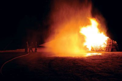 Heritage Days Bonfire
The Mattapoisett Fire Department lit a bonfire on Saturday, August 4 at Barstow Wharf.  The fire was part of a weekend-long celebration of Heritage Days, where the history of Mattapoisett was observed and honored. Photo by Felix Perez. 
