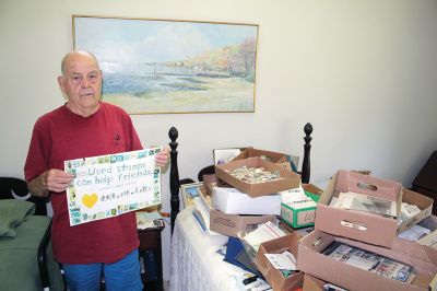 Brad Hathaway
Brad Hathaway has been nationally recognized for his effort to turn a stamp-collecting pastime into a fundraising tool for Quaker Missions. Photos by Mick Colageo
