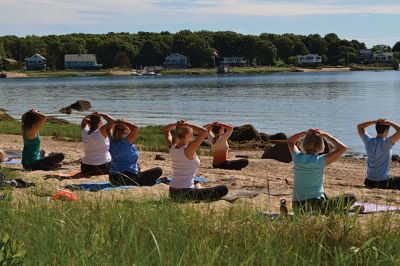 Brainard Marsh Yoga
About a dozen people enjoyed some gentle yoga by the calm, reflective waters off Brainard Marsh in Marion the early morning of June 21. The Sippican Lands Trust Summer Yoga Series is underway, with adult yoga on select Saturdays at 9:00 am and kids yoga at 10:00. The two other dates scheduled are July 5 and August 16. Photo by Jean Perry
