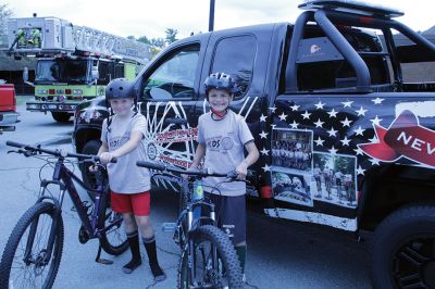 Brotherhood Ride 
Braydon Dion, left, and Remington Davenport took part in Saturday's Southern New England Kids Brotherhood Ride at Old Colony Regional Vocational Technical High School. Three years ago, Dion thought up the idea of a Kids Ride, which is unique to the local Brotherhood Ride chapter. The two 9-year-old friends are finishing up third grade this week at Rochester Memorial School. Photos by Mick Colageo
