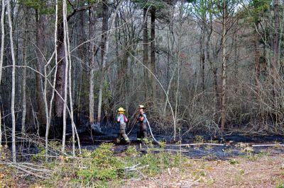 Brush Fire
A five-acre brushfire broke out on the Mattapoisett/Rochester town line on Saturday afternoon in the woods near Wolf Island Road and Long Plain Road. Photo by Eric Trippoli
