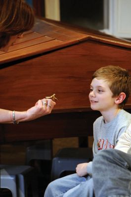 Bugworks
The Marion Natural History Museum provided an opportunity on February 27 to get up close and personal with critters from the insect world, including praying mantises and jumbo-sized grasshoppers. Above: Tapper Crete, 7, was the first one brave enough to ask to touch a praying mantis. The event was hosted by Maire Anne Diamond, owner and educator at ‘Bugworks.’ Photos by Felix Perez
