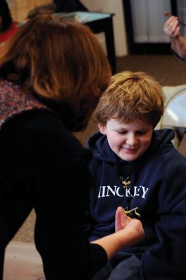 Bugworks
The Marion Natural History Museum provided an opportunity on February 27 to get up close and personal with critters from the insect world, including praying mantises and jumbo-sized grasshoppers. Above: Tapper Crete, 7, was the first one brave enough to ask to touch a praying mantis. The event was hosted by Maire Anne Diamond, owner and educator at ‘Bugworks.’ Photos by Felix Perez
