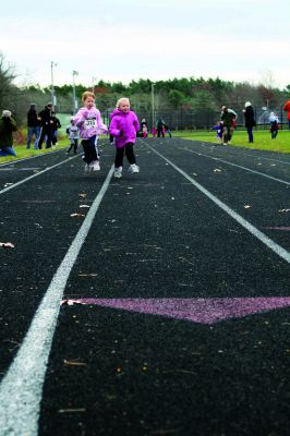 3rd Annual Bulldog Dash
Almost 200 runners and walkers braved the autumn wind chill to turn out for the third annual ORR Bulldog Dash on Saturday, November 24. The dash was held to raise funds for the purchase of an Automated External Defibrillator (AED) for the athletic department as well as to purchase equipment for the Cross Country teams. Photos by Paul Lopes
