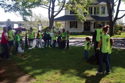 Marion Clean Up
Marion residents gathered together at Music Hall on Saturday, May 12, 2012, for the annual town-wide trash pick-up.  Volunteers spread out over town picking up garbage and recyclable materials from the road side. Photo by Eric Tripoli.
