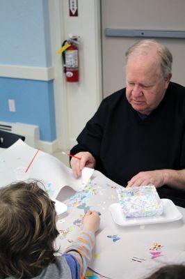 Create & Connectivity
As part of Art Week, the Marion Art Center joined the Council on Aging on Saturday morning, May 4, for a seniors and children’s “Create & Connectivity” event at the Benjamin D. Cushing Community Center. Participants of all ages used colorful paper cuts and glue to decoupage small wooden trays. Photos by Jean Perry
