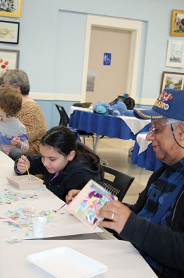 Create & Connectivity
As part of Art Week, the Marion Art Center joined the Council on Aging on Saturday morning, May 4, for a seniors and children’s “Create & Connectivity” event at the Benjamin D. Cushing Community Center. Participants of all ages used colorful paper cuts and glue to decoupage small wooden trays. Photos by Jean Perry
