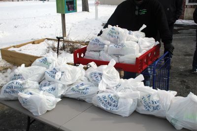 Valentine’s Day Drive-thru
Volunteers distributed over 100 dinners during the Marion Council on Aging’s Valentine’s Day drive-thru event on February 13 at the Cushing Community Center. The dinners donated by Mike Crosby helped make up for the fact the town’s seniors were not able to enjoy Valentine’s Day quite like they did last year inside the building with music and dancing. Photos by Mick Colageo
