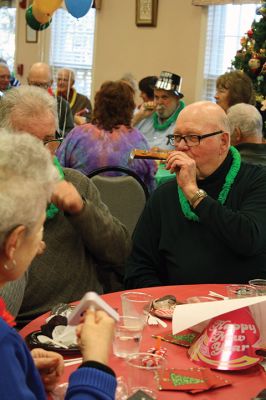 New Year’s Eve Party
A New Year’s Eve party at the Rochester Senior Center gave area seniors the chance to ring in the New Year early in the company of friends. Guests enjoyed dinner and dessert followed by the sharing of New Year’s resolutions and non-alcoholic bubbly. Balloons dropped from the ceiling at 1:30 pm after a symbolic countdown to the New Year, and guests made a ruckus with noisemakers to welcome 2016. Photos by Jean Perry
