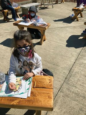 Nurse Thayer Memorial Outdoor Classroom
Rochester Memorial School first grader Grace Scanlon works on her art lesson in the Nurse Thayer Memorial Outdoor Classroom. The creation of the classroom, which sits in one of the courtyards at the school, was conceived in January 2020, two months before school was shut down by the state due to the coronavirus pandemic. Photo by Joanne Smith - April 15, 2021 edition
