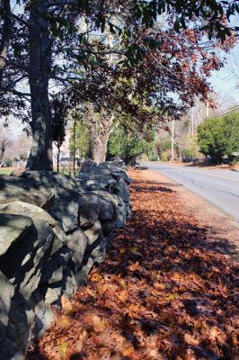 Mendell Road
Amidst Tuesday’s silent backdrop of rust-colored leaves nestled between a stone wall and Mendell Road, the Town of Rochester has done a great deal of business over the last week sandwiching a Special Town Meeting in between two Board of Selectmen meetings yielding approval for new highway equipment, the codification of bylaws, and a new assessor’s report. Stories inside. Photo by Mick Colageo - November 19, 2020 edition
