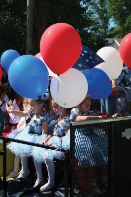 Celebrating Independence
The Sun finally broke through the clouds to help make for a glorious Tri-Town Fourth of July weekend highlighted by Marion's annual Independence Day Parade, hosted by the Benjamin D. Cushing Post 2425 Veterans of Foreign Wars. Parade goers lined the streets of Marion Village as floats, antique vehicles, bands, and emergency vehicles made their way along the parade route this past Saturday morning. Photo by Robert Chiarito. July 9,2009 Edition
