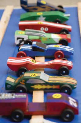 Derby Days
On Saturday, January 30, 2010 Marion's Scouts Pack 32 held the first Pine Wood Derby in three years. The Derby was held at the Sippican School where scouts raced cars weighing less than 5 ounces down a sloped wooden track. Everyone cheered as the wooden cars raced down the track in packs or four. Photo by Felix Perez. February 4, 2010 edition
