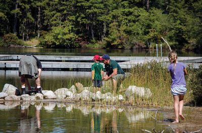 Gine Fishing
Rochester Scout Pack 30 had a fishing day at Five Mile Pond at Camp Cachelot in Myles Standish State Forest on September 27. The Cub Scouts were being trained in the art of fishing, tying knots for their hooks, as well as baiting a hook. Joshua Ernstzen, 7, (middle right) was the first Cub Scout to catch a fish. Photos by Denzil Ernstzen
