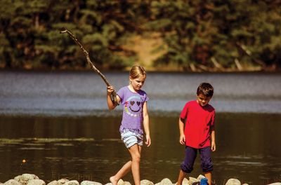 Gine Fishing
Rochester Scout Pack 30 had a fishing day at Five Mile Pond at Camp Cachelot in Myles Standish State Forest on September 27. The Cub Scouts were being trained in the art of fishing, tying knots for their hooks, as well as baiting a hook. Joshua Ernstzen, 7, (middle right) was the first Cub Scout to catch a fish. Photos by Denzil Ernstzen
