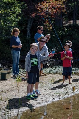 Gine Fishing
Rochester Scout Pack 30 had a fishing day at Five Mile Pond at Camp Cachelot in Myles Standish State Forest on September 27. The Cub Scouts were being trained in the art of fishing, tying knots for their hooks, as well as baiting a hook. Joshua Ernstzen, 7, (middle right) was the first Cub Scout to catch a fish. Photos by Denzil Ernstzen
