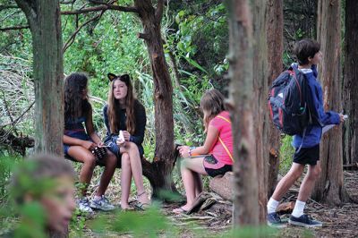 Happy Campers 
What's happening on a Tuesday morning at Camp Massasoit? It’s easier to ask what's not going on – swimming, boating, archery, crafts, exploring, wall climbing, ball playing, and that's all before they even break for lunch. Photos by Jonathan Comey
