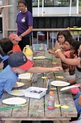 Happy Campers 
What's happening on a Tuesday morning at Camp Massasoit? It’s easier to ask what's not going on – swimming, boating, archery, crafts, exploring, wall climbing, ball playing, and that's all before they even break for lunch. Photos by Jonathan Comey
